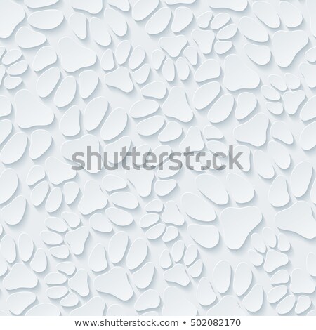 Foto stock: A Lot Of Dogs Paw Prints On Light Gray Background