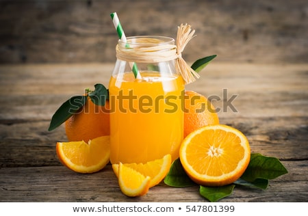 Stok fotoğraf: Glass Of Organic Fresh Orange Juice With Fruits
