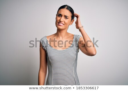 Zdjęcia stock: Thoughtful Brunette Wearing White Dress