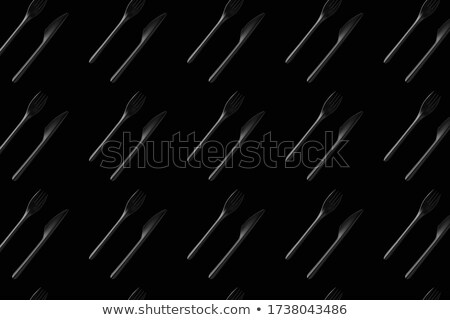 Foto stock: Colorful Pattern From Plastic Eating Utensil On A Grey Background