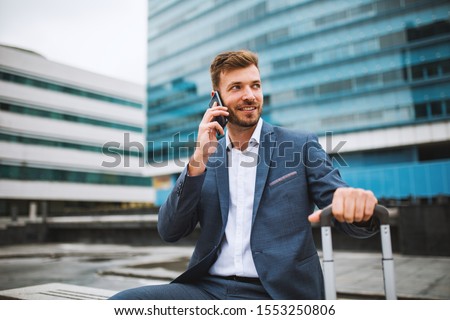 Stok fotoğraf: Positive Businessman Talking On A Phone