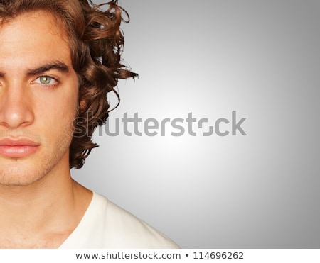 Stockfoto: Handsome Young Man Looking Confused