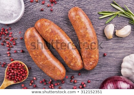 Stock photo: Raw Pork Sausages And A Bunch Of Rosemary