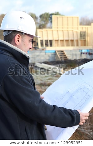 Stock photo: Architect Stood By Unfinished Wall