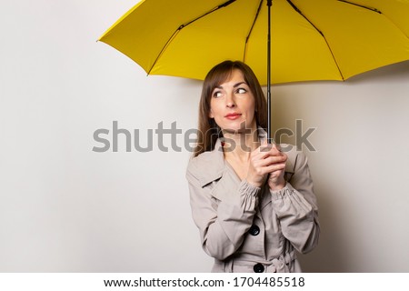 Stock photo: Woman Holding Umbrella