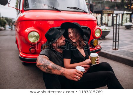 Stock fotó: Girl With Coffee In Retro Minivan