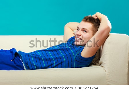 Сток-фото: Boy Relaxing On Couch Teen Positive Laying Lazy