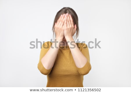 Woman Covering Face With Hands Foto stock © Koldunov