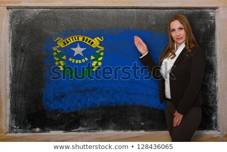 Teacher Showing Flag Ofnevada On Blackboard For Presentation Mar [[stock_photo]] © vepar5