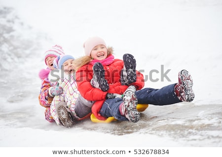 商業照片: Happy Kids With Sled Having Fun Outdoors In Winter