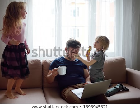 [[stock_photo]]: Father With Kids Working From Home During Quarantine Stay At Home Work From Home Concept During Co