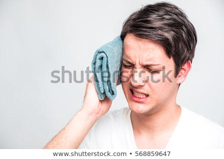 Foto d'archivio: Boy Feeling Ill From Heat Stroke