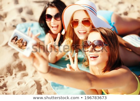 ストックフォト: Woman In Sunglasses Taking Selfie On Summer Beach