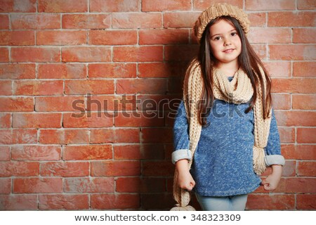 Stock foto: Portrait Of A Preschool Girl In Autumn In Warm Clothes And A Scarf