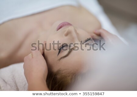 Young Beautiful Woman Getting Back Massage Foto stock © dotshock