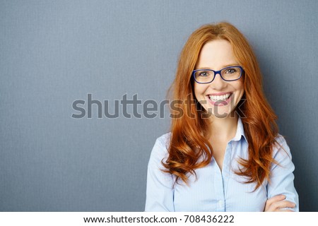 Stock fotó: Pretty Woman Against A Grey Background