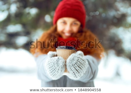 Stockfoto: Woman With A Cup Of Hot Tea Or Coffee Posing Outdoors