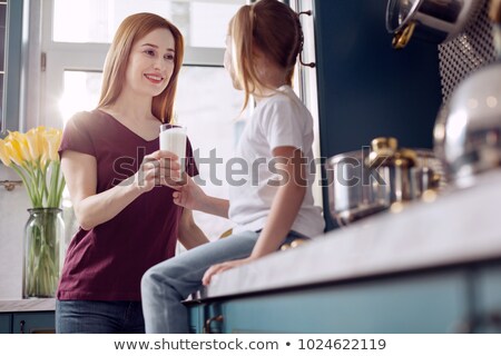 Zdjęcia stock: Mother Gives Her Daughter Drink