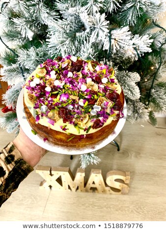 Foto stock: Delicious Orange Cake With Persian Figs And Pistachio At Christmas