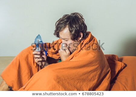 Stock photo: Man With Flu Or Cold Symptoms Making Inhalation With Nebulizer - Medical Inhalation Therapy