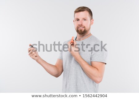 Zdjęcia stock: Bearded Young Sports Trainer Or Referee With Whistle Looking At You
