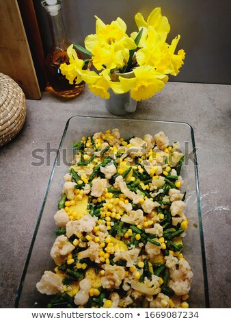 Foto stock: Corn Grains White Broccoli And Asparagus Beans In A Glass Plate Before Baking