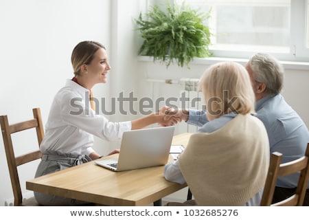 [[stock_photo]]: Female Estate Agent Working At Desk