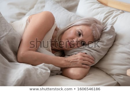 Stock fotó: Nostalgic Woman Lying In An Apartment