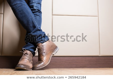 Zdjęcia stock: Young Casual Man Wearing Boots
