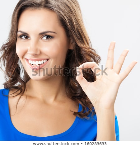 Foto stock: Woman Showing Okay Gesture