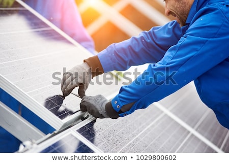 Сток-фото: Solar Photovoltaic Panel Array On Roof