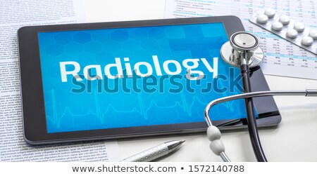 Stock fotó: Tablet With The Medical Specialty Radiology On The Display