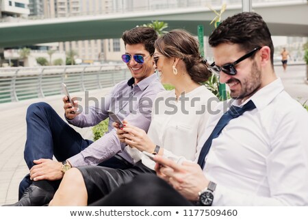 Stock photo: Three Women Sitting In Marina Harbor