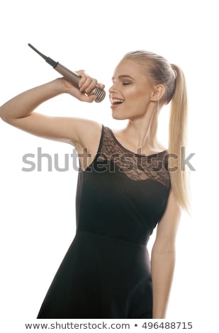 Foto stock: Young Pretty Blond Woman Singing In Microphone Isolated Close Up