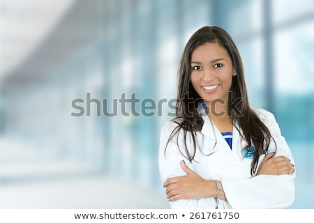 ストックフォト: Young Female Doctor By The Window