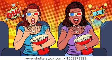 Stock photo: Two Women With 3d Glasses React Differently To The Movie Laughs