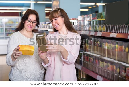 Stock photo: Female Customer Buying Herbal Tea