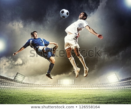 Stock fotó: Soccer Football Players Compete At The Stadium Two Footballers