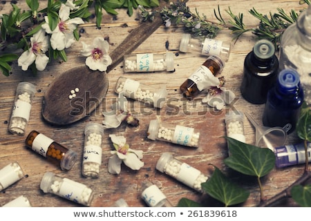 Stock fotó: Bottle And Globule In Spoon Of Homeopathic Medication