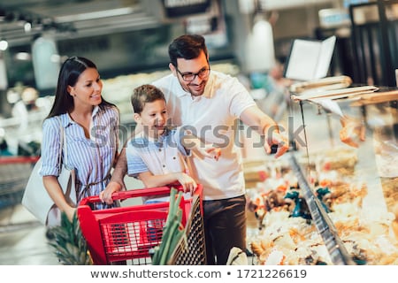 Foto stock: Young Woman In Supermarket