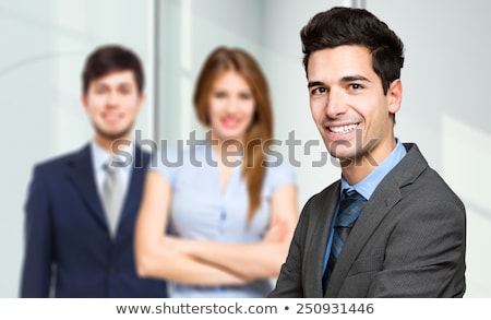 Stockfoto: Three Businesspeople Welcoming You