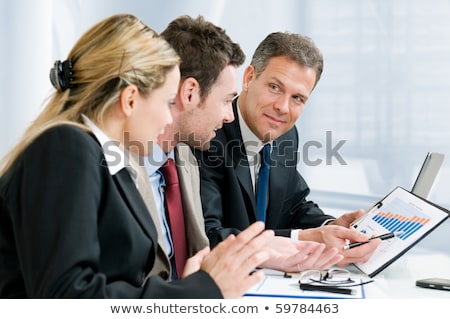 Zdjęcia stock: Businessman Showing A Document To His Colleague