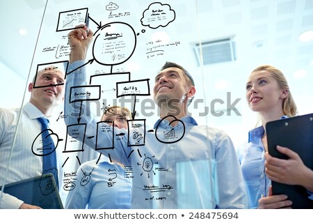 Сток-фото: Businessman Drawing Chart And Discussing It With Businesswoman Vector Illustration