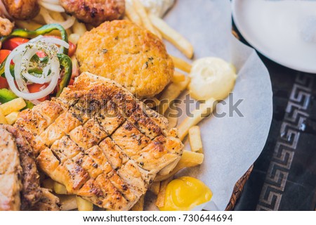 Zdjęcia stock: Big Set Greek Food Meat Plate With Potatoes And Sauce