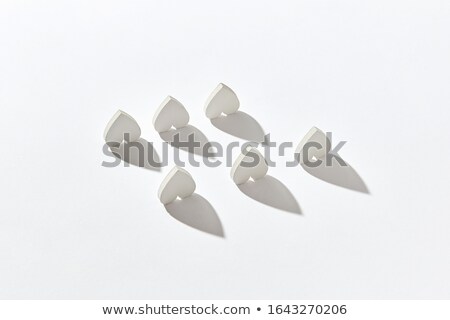 Stock foto: Pattern From Gypsum Inverted Hearts With Hard Shadows