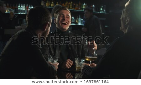 Stok fotoğraf: Young Man At The Bar