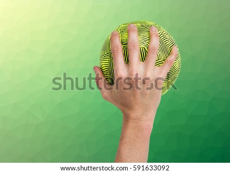 Foto d'archivio: Hand Of Athlete Holding Ball Against Textured Green Background