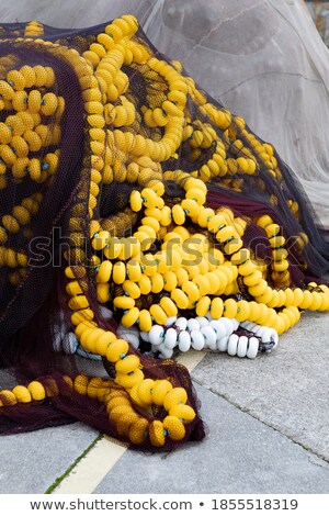 Сток-фото: Fishing Tackle Net Detail With Yellow Buoy