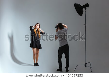 Zdjęcia stock: Beautiful Female Model Posing In A Photographic Studio