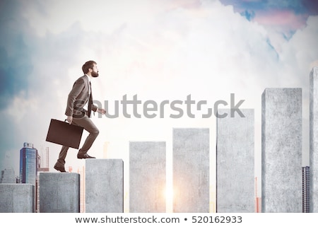 Stock photo: Side View Of Businessman Working On Graphs